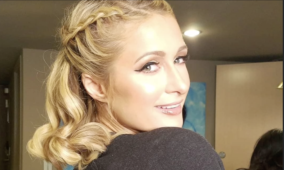 Paris Hilton with braided side-swept waves styled by Shazz